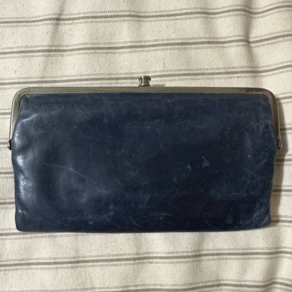 Hobo Lauren wallet. Navy with burgundy/floral pattern inside